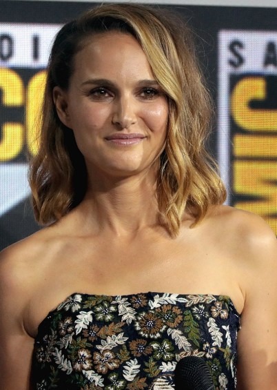 a smiling Natalie Portman
